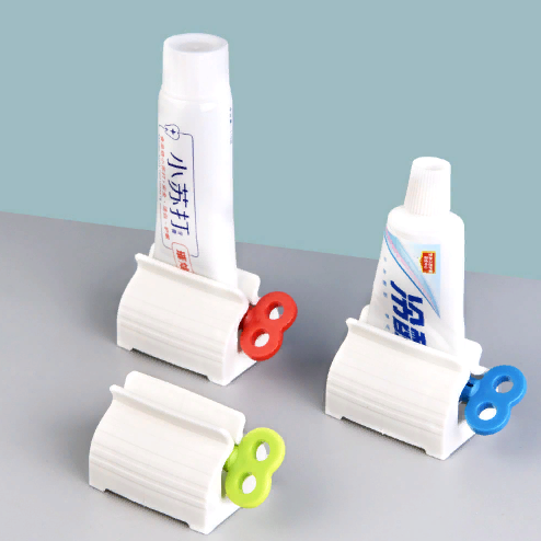 Manual toothpaste dispenser (1 pc.)