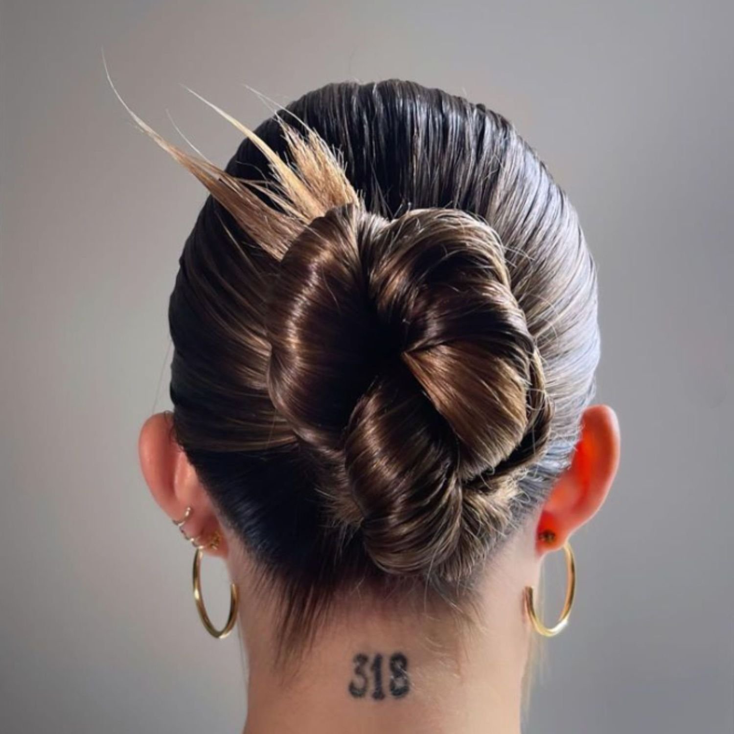 slicked-back midi bun.