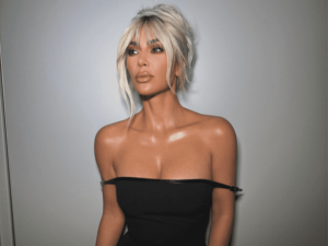 Kim Kardashian Channels Pamela Anderson With Blonde Bangs