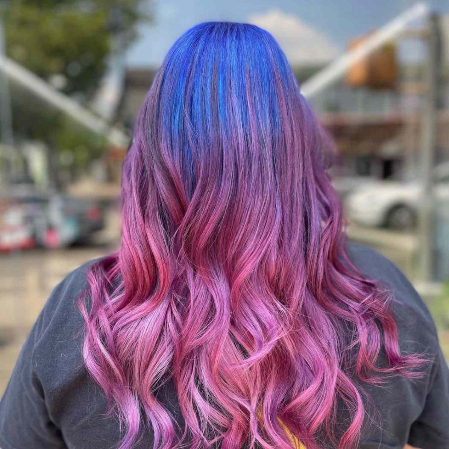 Blue to pink ombre hair.